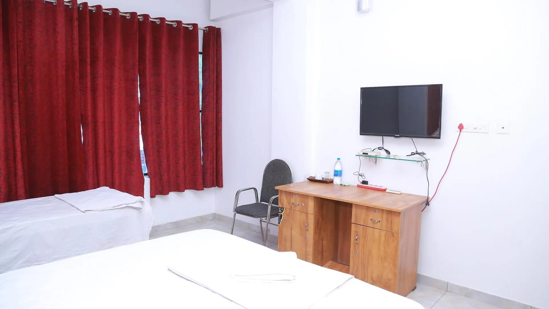The Erumely Palace Mundakayam Hotel